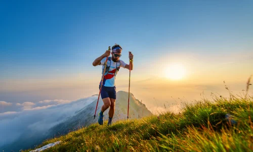 man-with-poles-in-the-mountains-2025-03-10-00-36-31-utc
